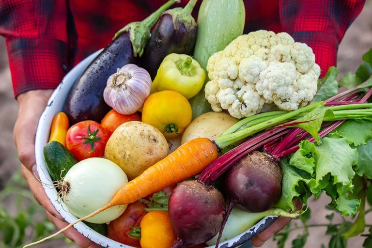 A bowl of eye health food including lutein-rich vegetables and eggs